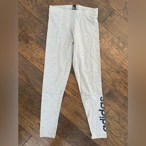 Brand new Adidas leggings. Size small. Grey with navy blue logos.